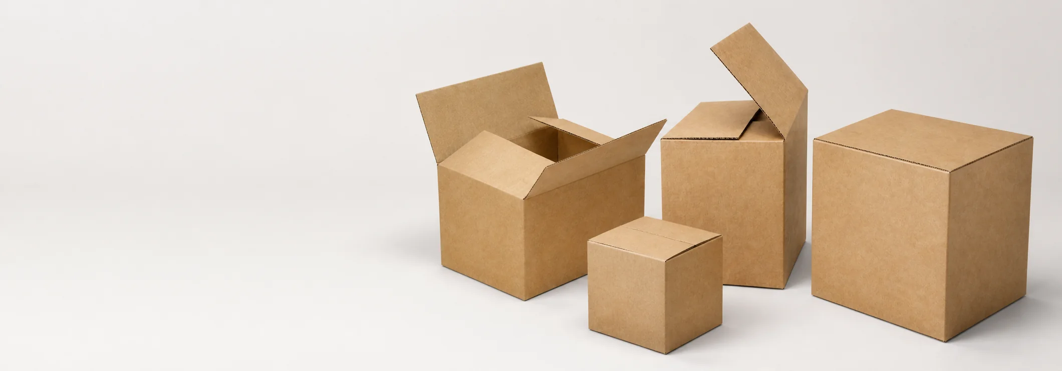Familia de cajas de cartón corrugado kraft con diferentes cierres de aletas
